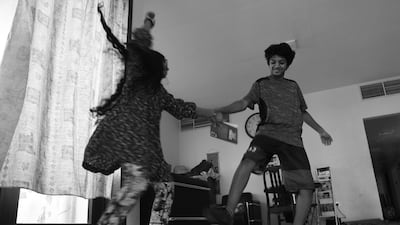 Vidhyaa Chandramohan's children playing football in the living room of their Abu Dhabi flat. Vidhyaa Chandramohan
