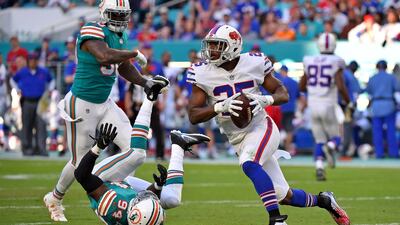 Buffalo Bills running back LeSean McCoy (25) runs the ball against the Miami Dolphins during Sunday's game. Jasen Vinlove / USA Today Sports
