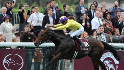 Irish jokey Michael Kinane rides Sea The Stars to victory at the Prix de l'Arc de Triomphe at Longchamp today.