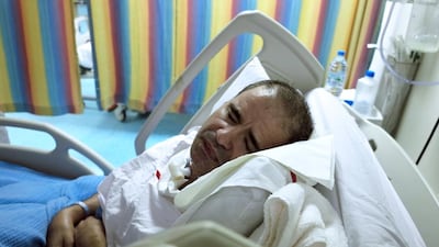 Syrian Khalid Al Shoufi, 44, has been in a coma for more than a year after suffering a severe stroke. Jeffrey E Biteng / The National
