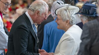 Prince Charles greets guests at the service. PA