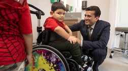 Hulusl Sert, (wheelchair) a four year old from Turkey, is the first patient to receive a new SMA medication in the UAE for muscular dystrophy at the Medcare Hospital, Al Qusais, Dubai. The procedure was conducted by Dr Vivek Mundada, Pediatric Neurologist at Medcare Royal Speciality Hospital. Attending the hospital visit with HulusI is his father Mustafa Sert, mother Anne Remziye and older brother Ramazan (six years old). Antonie Robertson/The National