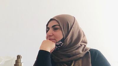 One of the participants, Souad, photographed during the Memories of Home workshop. Shubbak