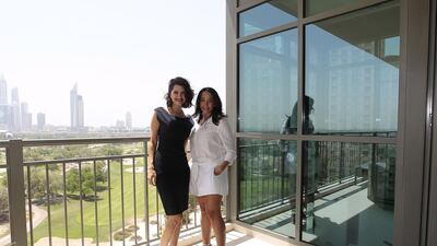 Ranya Khalil, right, and Sara Alemzadeh wear designer dresses which they offer to their clients. Jeffrey E Biteng / The National
