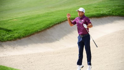 DUBAI, UNITED ARAB EMIRATES - NOVEMBER 16: Xander Schauffele of the United States jumps to watch his second shot on the 7th hole during day two of the DP World Tour Championship at Jumeirah Golf Estates on November 16, 2018 in Dubai, United Arab Emirates. (Photo by Ross Kinnaird/Getty Images)