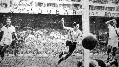 Uruguay’s Alcides Ghiggia, centre, scores the match-winner to silence Brazil in the World Cup final, at Maracana Stadium in Rio de Janeiro on July 16, 1950. Brazil has had a hard time forgetting that one match.