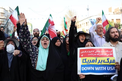 Iranians attend an anti-Israel rally in Tehran on Saturday. EPA