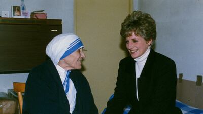 Princess Diana holds the hands of Mother Teresa during their first meeting at the Missionary Sisters of Charity residence in Rome, Italy, in 1992. Reuters