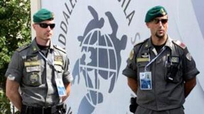 Police stand guard at the G8 summit site in L'Aquila, Italy. During a three day meeting beginning on Wednesday, leaders of the Group of Eight will push for common positions on a range of subjects.