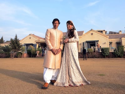 Then opposition leader Imran Khan (L) with Reham Khan during their wedding ceremony in Islamabad.