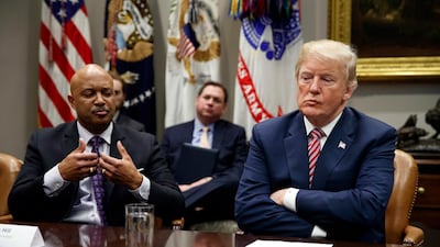 President Donald Trump listens as Indiana Attorney General Curtis Hill speaks during a meeting with state and local officials to discuss school safety in the Roosevelt Room of the White House, Thursday, Feb. 22, 2018, in Washington. (AP Photo/Evan Vucci)