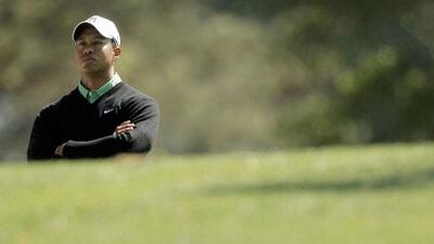 Tiger Woods waits to hit his tee shot on the fourth hole during second round play in the 2010 Masters golf tournament at the Augusta National Golf Club in Augusta, Georgia, on Friday, April 9, 2010.