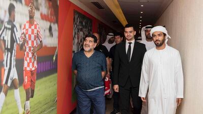 Diego Maradona walks through the Fujairah Stadium corridors on the day he was announced as the club's new manager. AFP