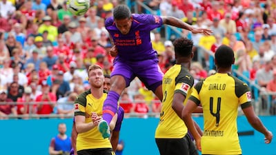Liverpool's Virgil van Dijk scores a goal. Reuters
