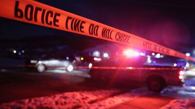 Police tape surrounds the crime scene in Enoch, Utah, where eight members of a family were found from gunshot wounds, Wednesday, Jan. 4, 2023. (Ben B. Braun / The Deseret News via AP)