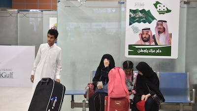 Passengers waiting for their flight at Abha airport in Saudi Arabia. AFP