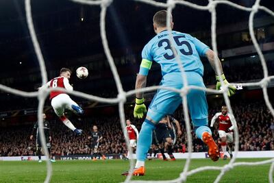 Arsene Wenger was all praise for Aaron Ramsey, who scored Arsenal's first and third goals on Thursday night. Eddie Keogh / Reuters