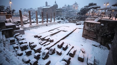 The Fori Imperiali is covered by snow during a snowfall in Rome, Italy. Angelo Carconi / EPA