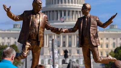 A temporary art installation representing President Donald Trump and Jeffrey Epstein holding hands on the National Mall in Washington, on October 3. AP