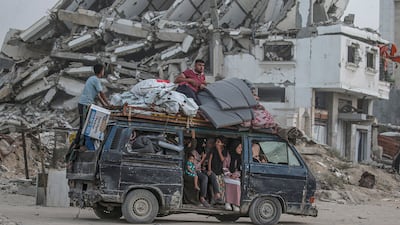 Palestinians leave Gaza city with their belongings after a forced displacement order was issued by the Israeli army. EPA