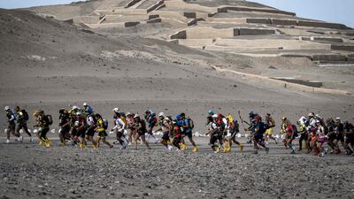 Competitors take part in the Marathon des Sables Peru first stage between Cahuachi and Coyungo in the Ica desert, 300 km south of Lima. Jean-Philippe Ksiazek / AFP Photo