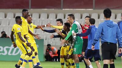 Faisel Darwish celebrates after scoring for Al Taawoun against Sharjah. Chris Whiteoak / The National