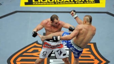 Wanderlei Silva, of Brazil, left, is kicked by Chuck Liddell during their light heavyweight bout at UFC 79 at the Mandalay Bay hotel and casino in Las Vegas, Saturday, Dec. 29, 2007.