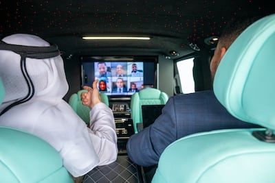Abdullah Al Nasser has a conference call while on the move. Ahmed Ramzan / The National