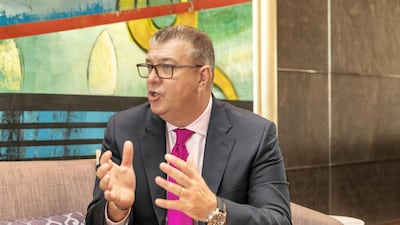 Sean Tompkins, chief executive of the Royal Institution of Chartered Surveyors, is lobbying the UAE to adopt global property measurement standards and mediation for construction disputes. Antonie Robertson / The National