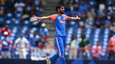 Arshdeep Singh of India celebrates after dismissing David Warner of Australia, caught by Suryakumar Yadav. Getty Images