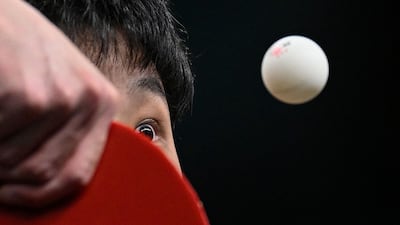Japan's Tomokazu Harimoto with eyes on the ball during his table tennis singles match against a Swedish opponent at the Olympic Games in Paris. AFP