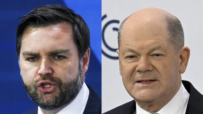 US Vice President JD Vance and German Chancellor Olaf Scholz at the Munich Security Conference. Mr Scholz has urged the US to avoid interfering in upcoming elections after Mr Vance criticised Europe's approach to mass migration. AFP / Reuters