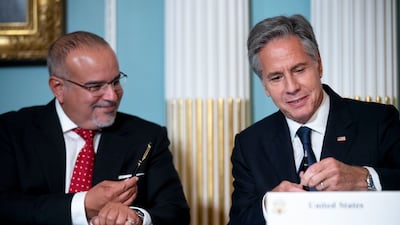 Bahrain's Crown Prince Salman bin Hamad Al Khalifa and US Secretary of State Antony Blinken during Wednesday's signing ceremony. AP
