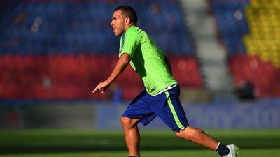 Carlos Tevez and Juventus were beaten 3-1 by Barcelona in the Champions League final. Shaun Botterill / Getty Images / June 5, 2015