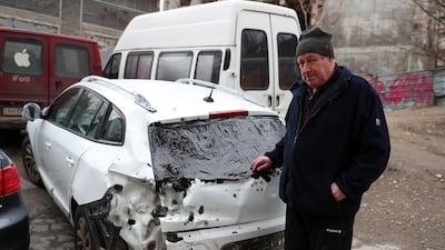 This man escaped from Mariupol and survived a landmine explosion with his wife. EPA