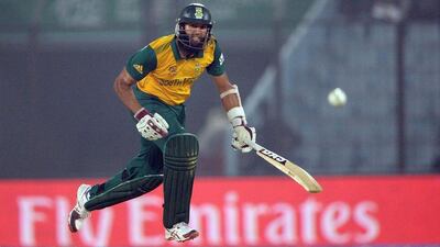 South Africa batsman Hashim Amla runs after playing a shot during the World Twenty20 tournament cricket match against England. Prakash Singh / AFP / March 29, 2014