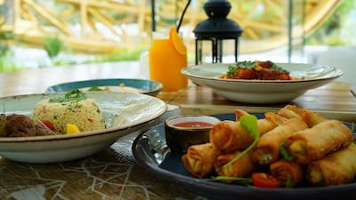 The menu includes Arabic and international dishes. Supplied