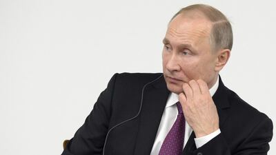 Russian president Vladimir Putin attends a Japanese-Russian business dialogue meeting with Japanese prime minister Shinzo Abe in Tokyo. Ma Ping / AP Photo