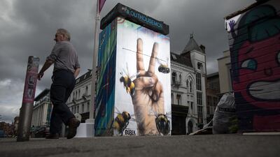 A mural by street artist Qubek in the city's arts district Northern Quarter. Getty Images