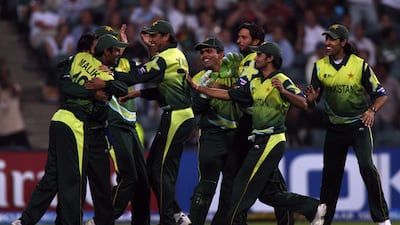 Pakistan players celebrate the fall of a Sri Lankan wicket at the Wanderers in Johannesburg, South Africa, during the inaugural T20 World Cup on September 17, 2007. Getty