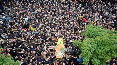 Hezbollah members and relatives carry the coffin of one of the five fighters killed in Idlib, Syria, during a funeral procession in the southern suburb of Beirut, Lebanon. EPA