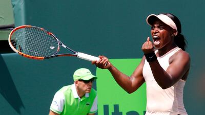 Sloane Stephens celebrates reaching the Miami Open final by beating Victoria Azarenka. Joe Skipper / AP Photo