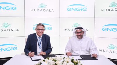 Mubadala's Badr Al Olama, right, and Engie Energy Solution's Ian Harfield during the signing ceremony. Photo: Mubadala
