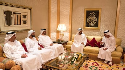 From left: Sheikh Saif bin Zayed, Sheikh Nahyan bin Zayed, Sheikh Mohamed bin Zayed; Sheikh Mohammed bin Rashid; and Sheikh Hazza bin Zayed attend a reception for the KhalifaSat engineering team. Hamad Al Kaabi / Crown Prince Court - Abu Dhabi