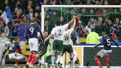 France's William Gallas, second right, scores the winning goal after being set up by Thierry Henry, left, during the Fifa World Cup qualifier at the Stade de France in Paris.