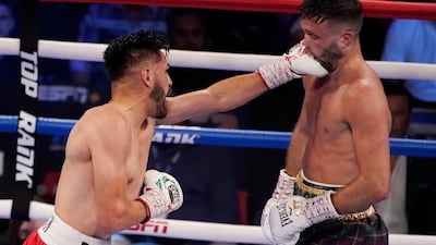 Jose Ramirez lands a punch on Josh Taylor. PA