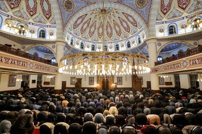 The report said practising Muslim worshippers faced a higher risk of discrimination. EPA