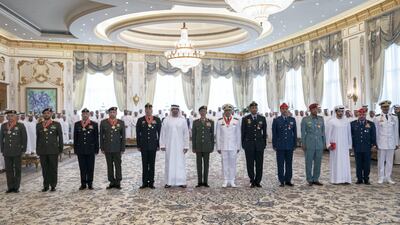 Sheikh Mohamed bin Zayed stands for a photograph with members of the UAE Armed Forces who received Emirates Military Medals during a Sea Palace barza. Seen with Rear Admiral Pilot Sheikh Saeed bin Hamdan bin Mohamed Al Nahyan, Commander of the UAE Naval, right; Major General Ibrahim Nasser Al Alawi, Commander of the UAE Air Forces and Air Defence, second right; Sheikh Mohamed bin Suroor Al Nahyan, sixth right; and Lt General Hamad Thani Al Romaithi, Chief of Staff UAE Armed Forces, eighth right.