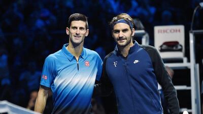 Roger Federer, right, alongside Novak Djokovic before the ATP World Tour Finals. Andy Rain / EPA