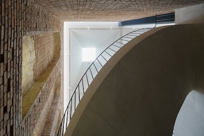 The sweeping central white staircase at Argo Contemporary Art Museum and Cultural Centre in Tehran, Iran. Photo: Deed Studio / Aga Khan Trust for Culture